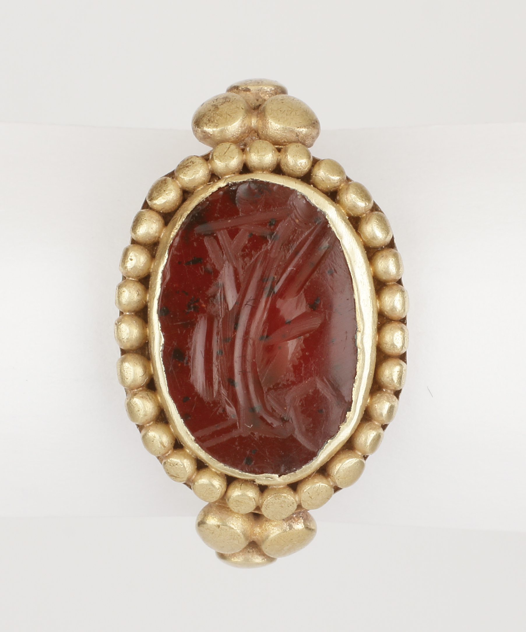 A Merovingian Frankish Gold Finger-Ring with a Re-used Late Imperial  Carnelian Intaglio